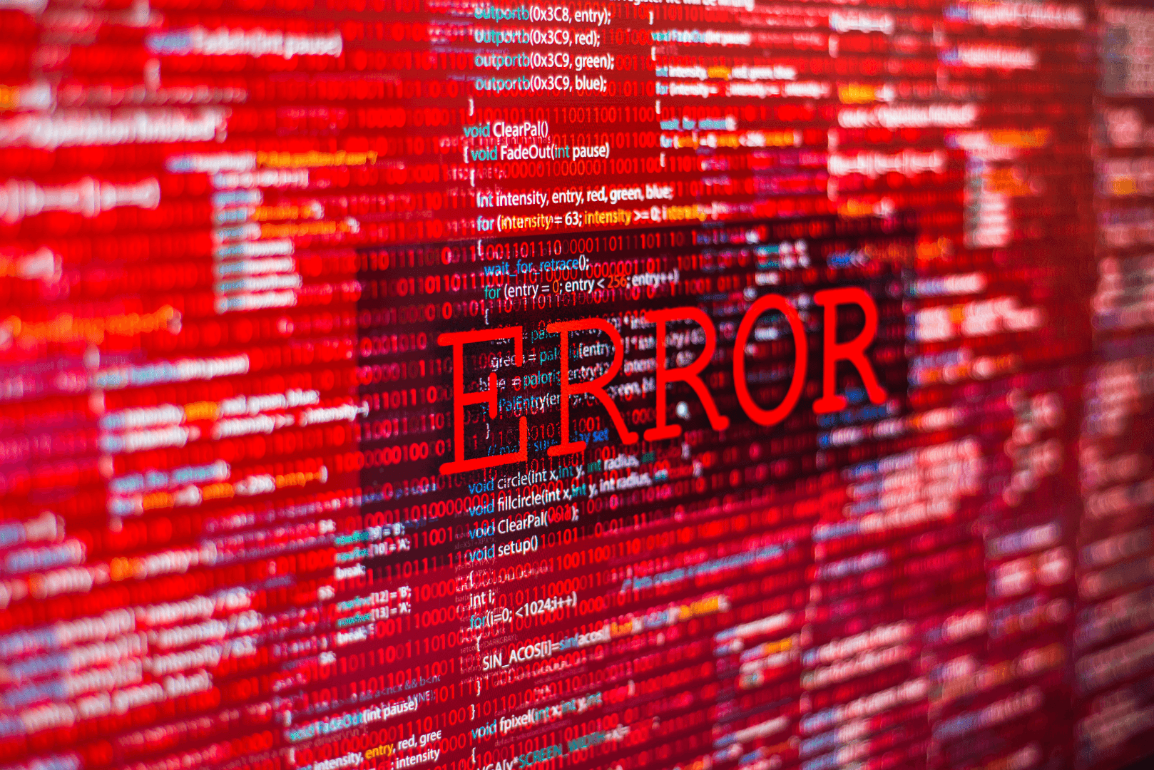 Czerwony ekran z rzędami cyfrowego kodu i dużym napisem ERROR w centrum – wizualizacja krytycznej awarii witryny bez opieki technicznej.